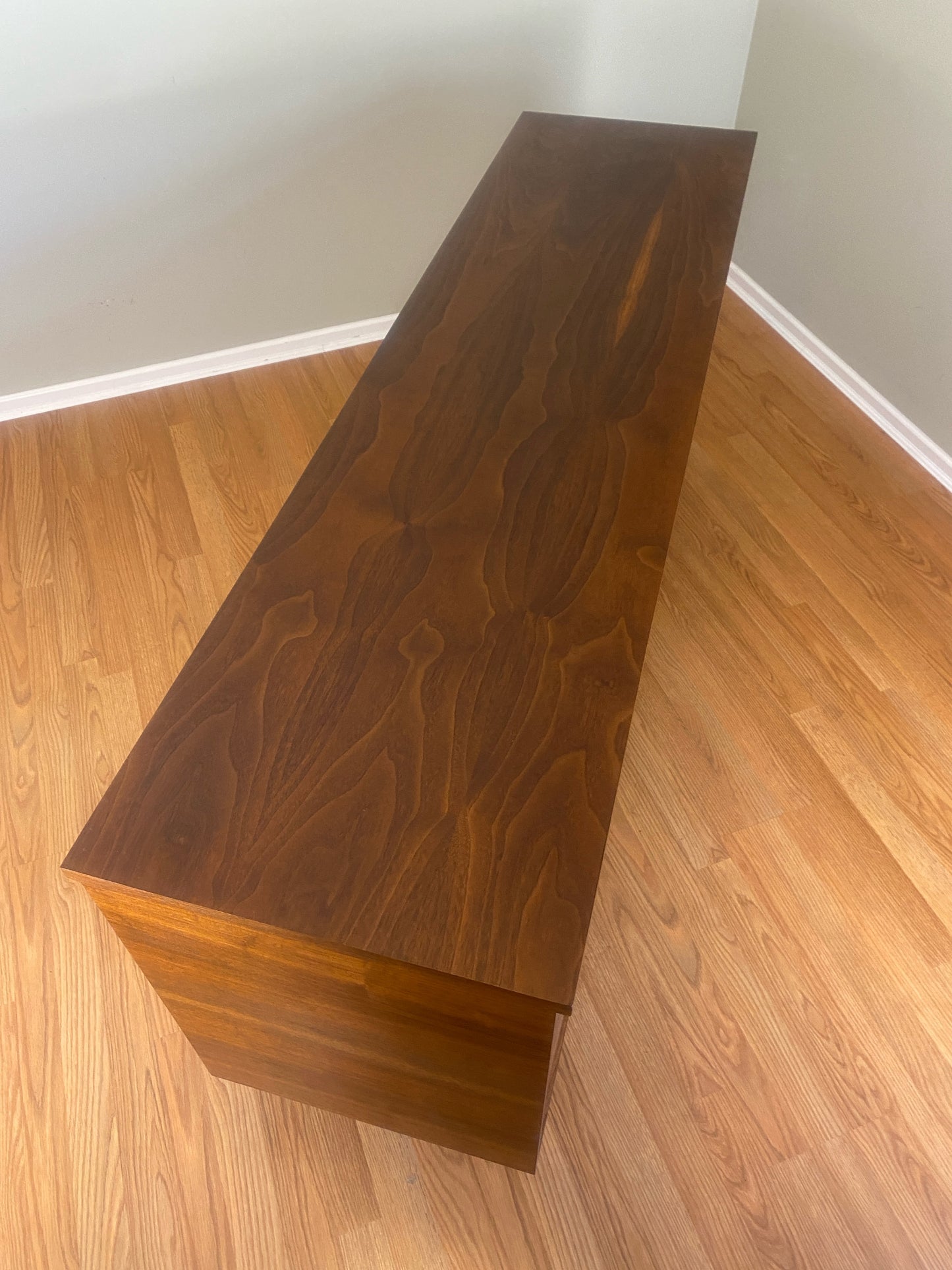 Mid Century Modern Refinished Nine Drawer Walnut Dressser with Sculpted Wooden and Gold Pulls