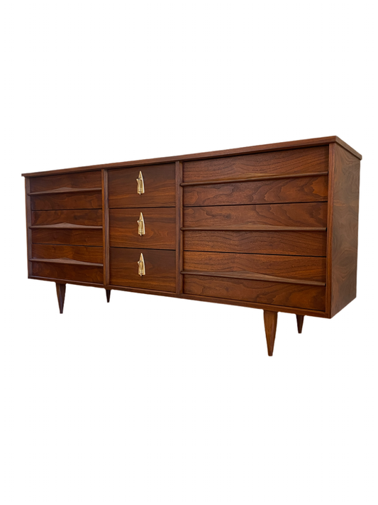 Mid Century Modern Refinished Nine Drawer Walnut Dressser with Sculpted Wooden and Gold Pulls